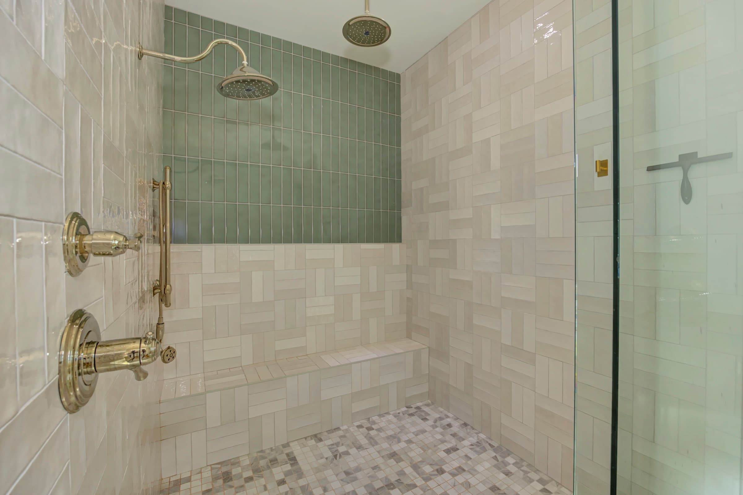 Craft detail: Book-matched marble in the primary shower