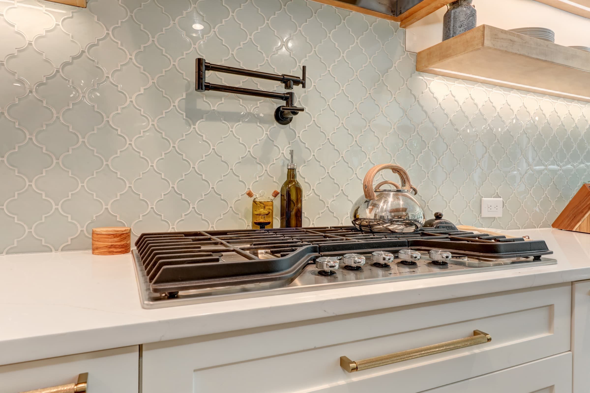 Craft detail: A pot-filler and handmade tile at the range