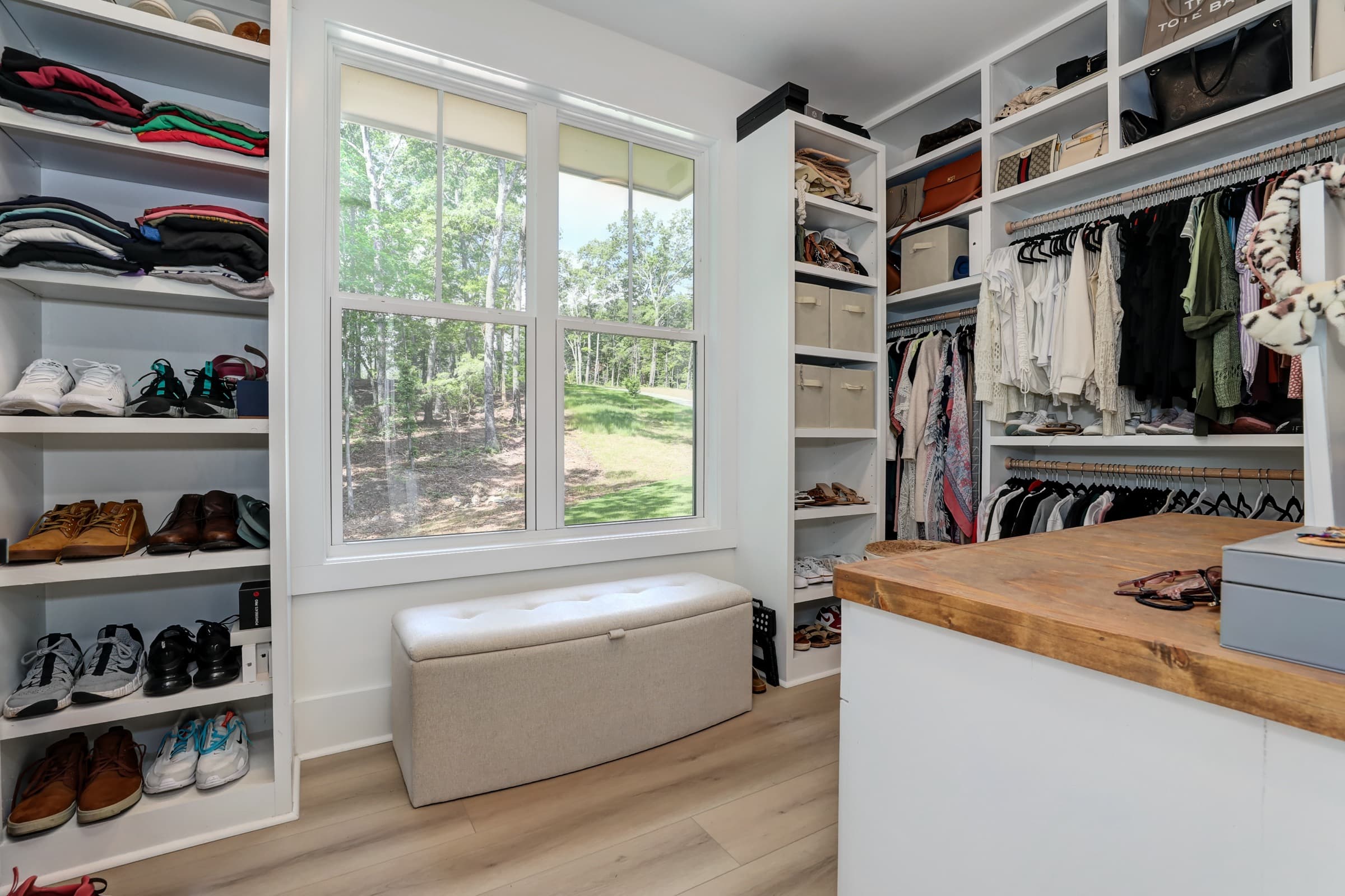 Craft detail: A walk-in closet with a live-edge island